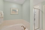Master Bath has jetted tub and walk-in shower